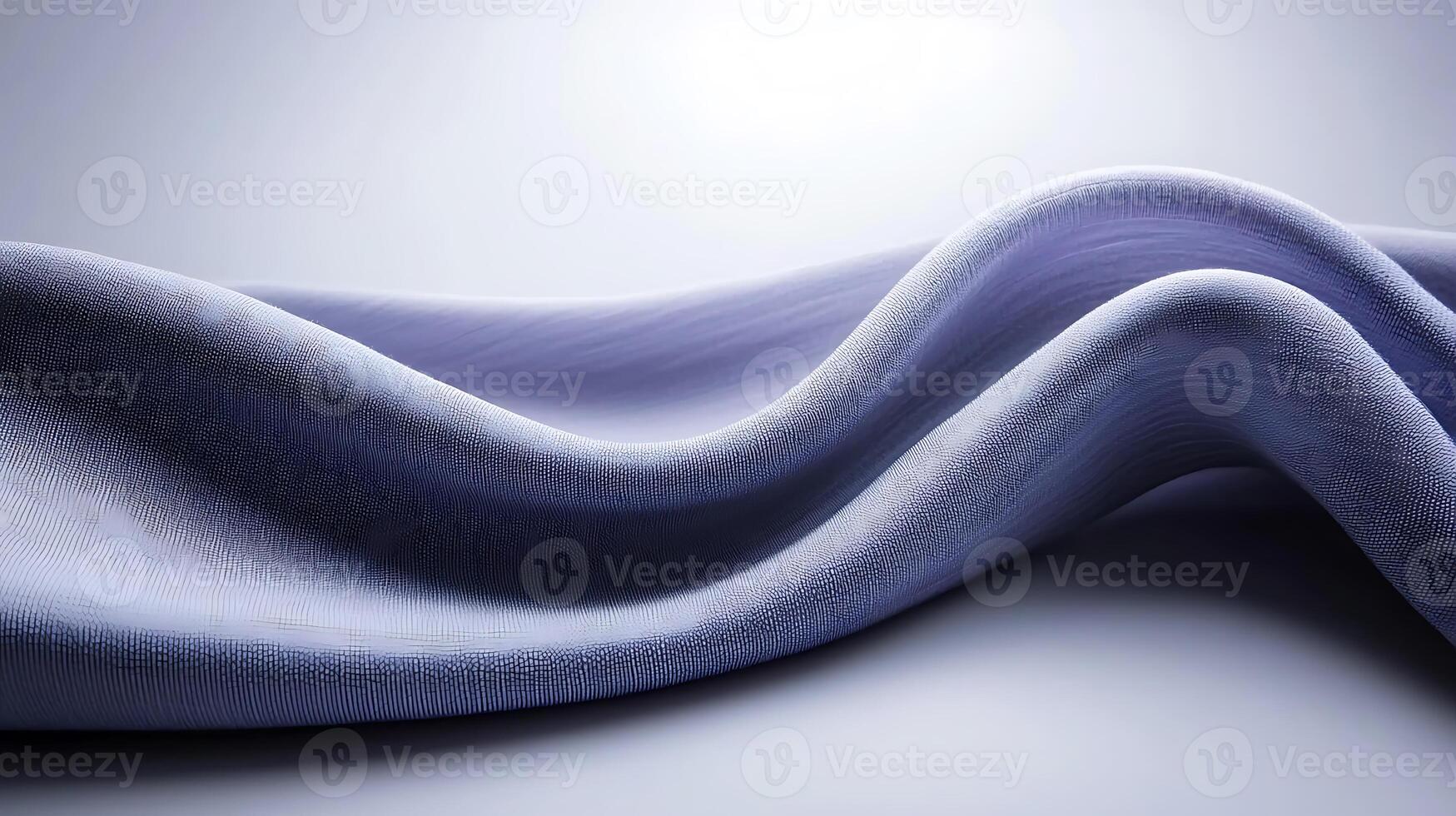Soft, flowing fabric draped elegantly, showcasing gentle curves and smooth texture in a minimalistic setting photo