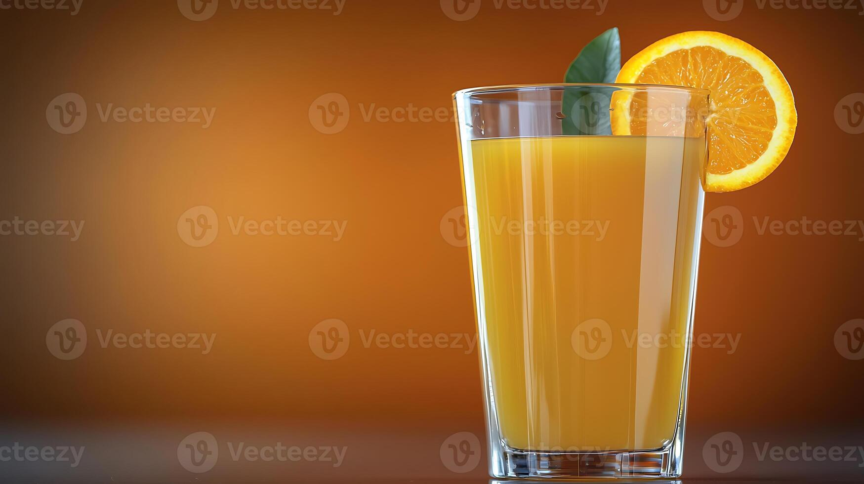 Refreshing glass of orange juice garnished with a slice and leaf against a warm background photo