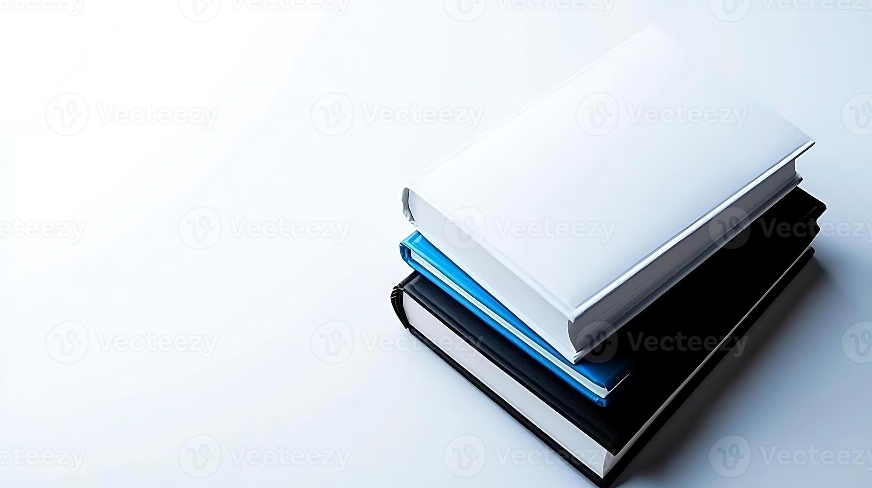 Stacked books with blank covers on a clean surface, ideal for educational or promotional use photo