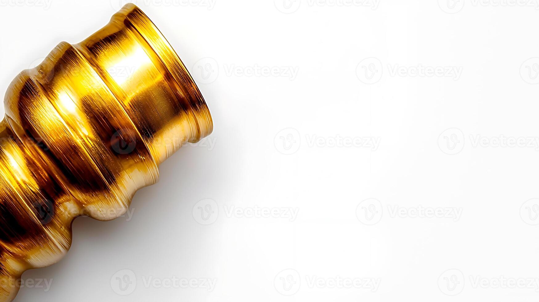Shiny golden vase positioned on a white background, showcasing elegant curves and reflections photo