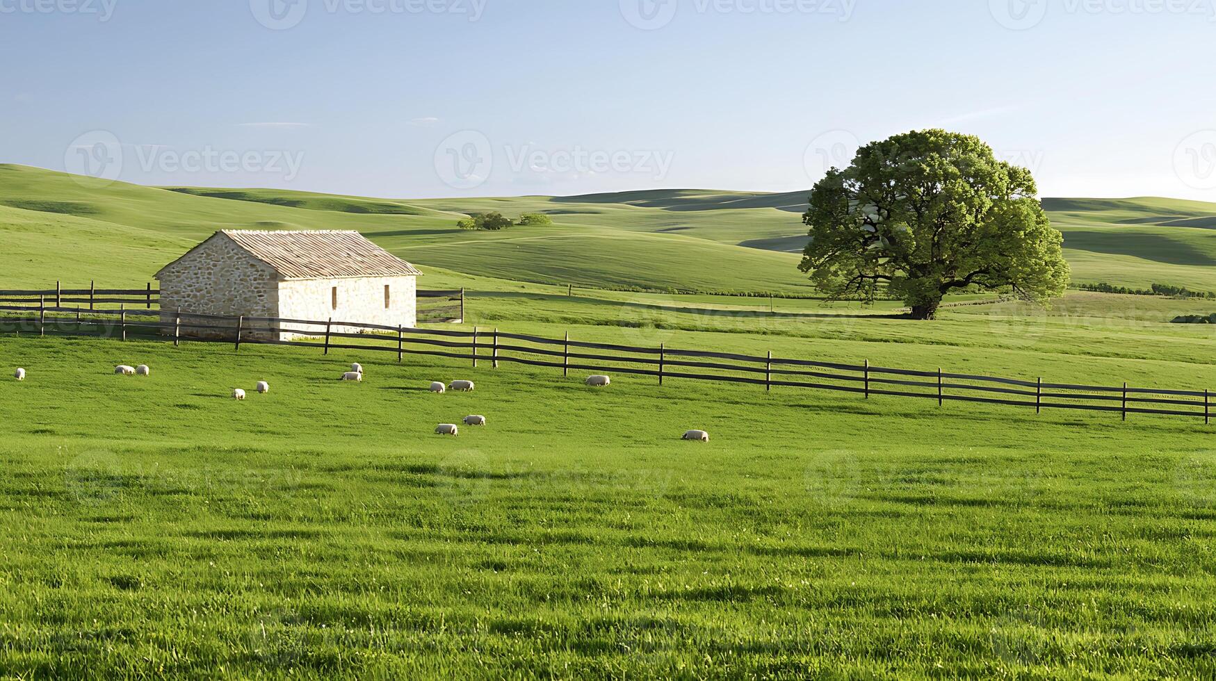 Serene countryside landscape featuring a rustic barn and grazing sheep under a clear sky photo
