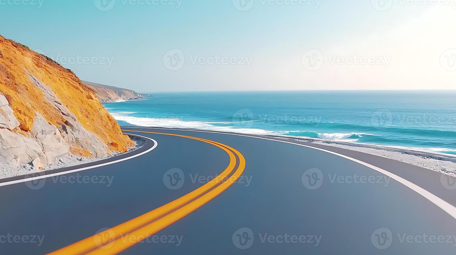 Scenic coastal road winding along the ocean, with cliffs and waves in the background photo