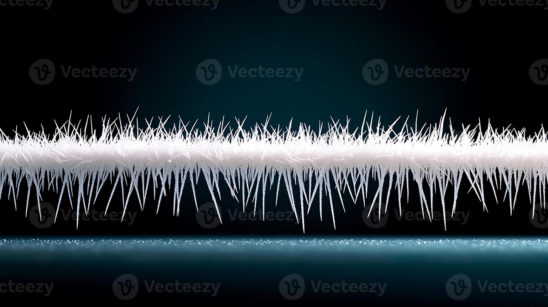 Close-up of a textured surface with fine, white fibers against a dark background, showcasing intricate details photo