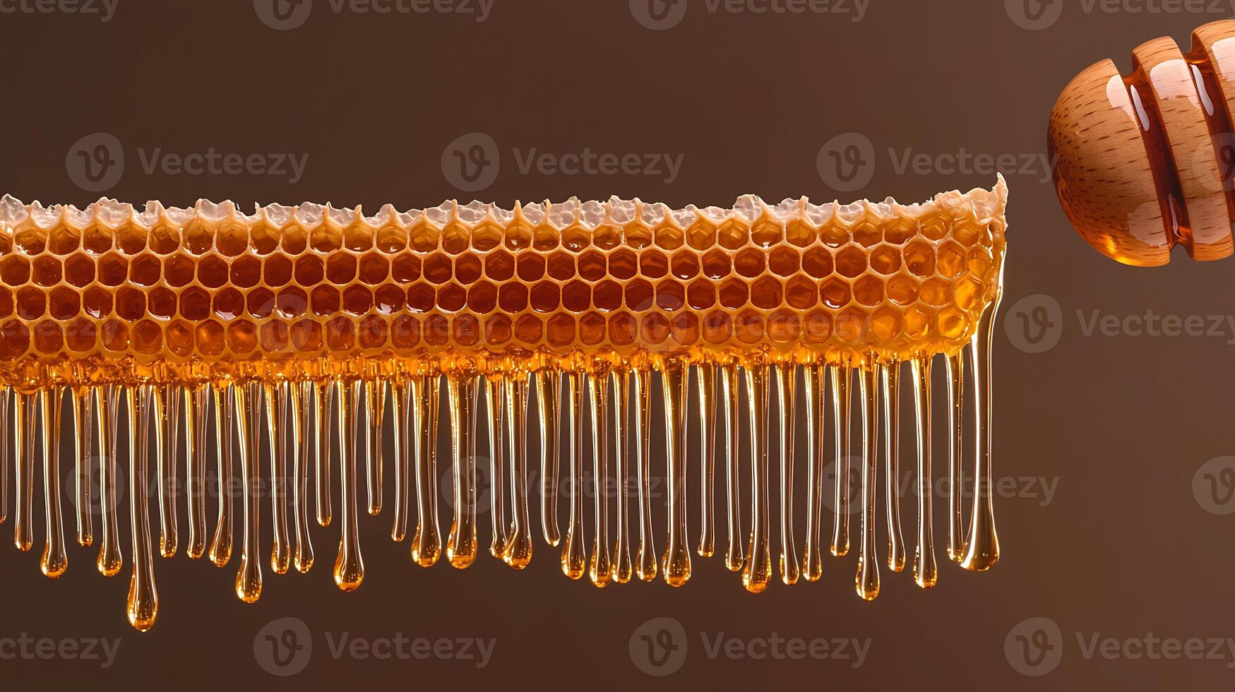 Close-up of honeycomb dripping with honey, showcasing texture and natural sweetness in a warm setting photo