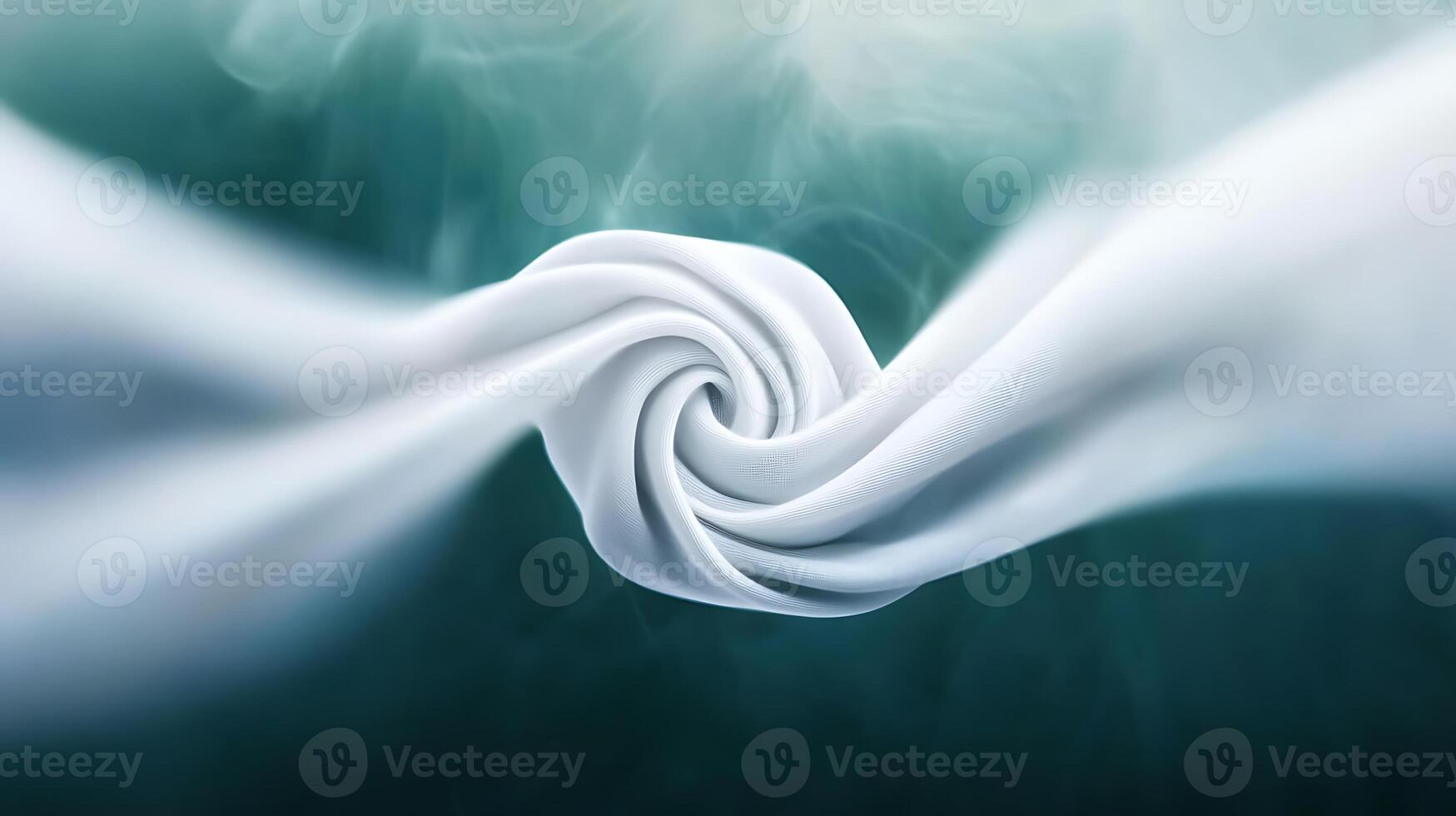 Abstract swirl of white fabric twisting against a soft, blurred teal background, creating a serene atmosphere photo