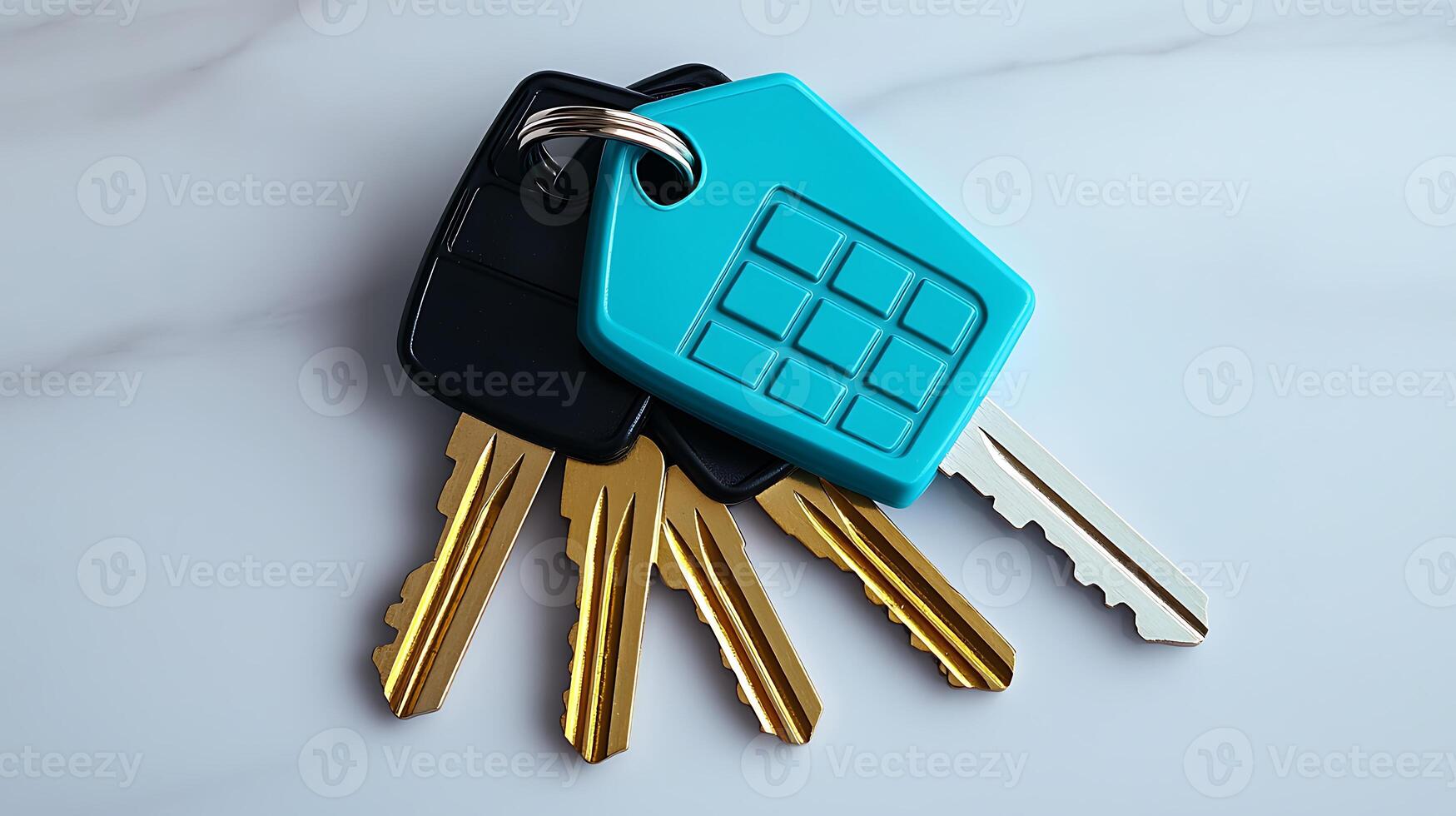Close-up of a set of colorful keys on a marble surface, showcasing a unique keychain design photo