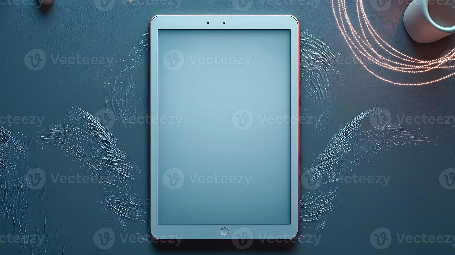 A modern tablet resting on a textured blue surface with soft lighting, ideal for tech showcases photo