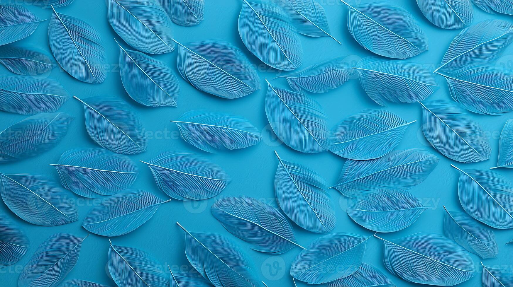A vibrant arrangement of blue leaves on a turquoise background, creating a serene atmosphere photo