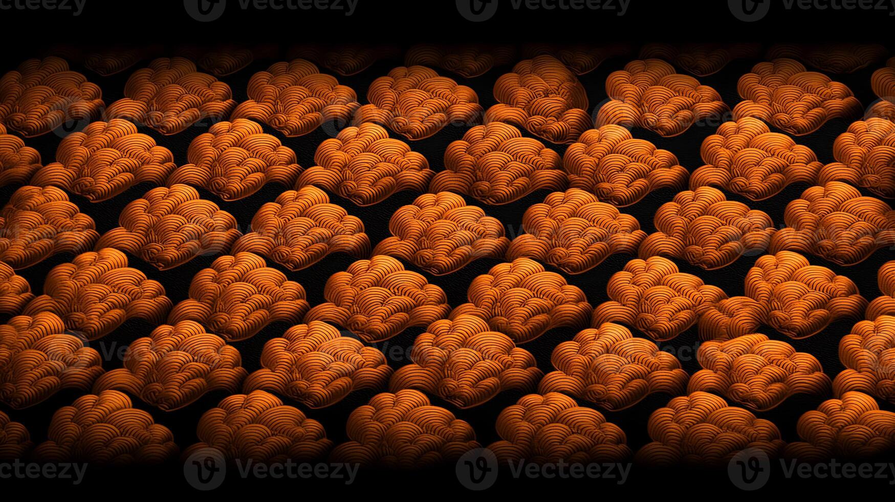 A vibrant pattern of orange brain-shaped objects arranged in a grid on a dark background photo