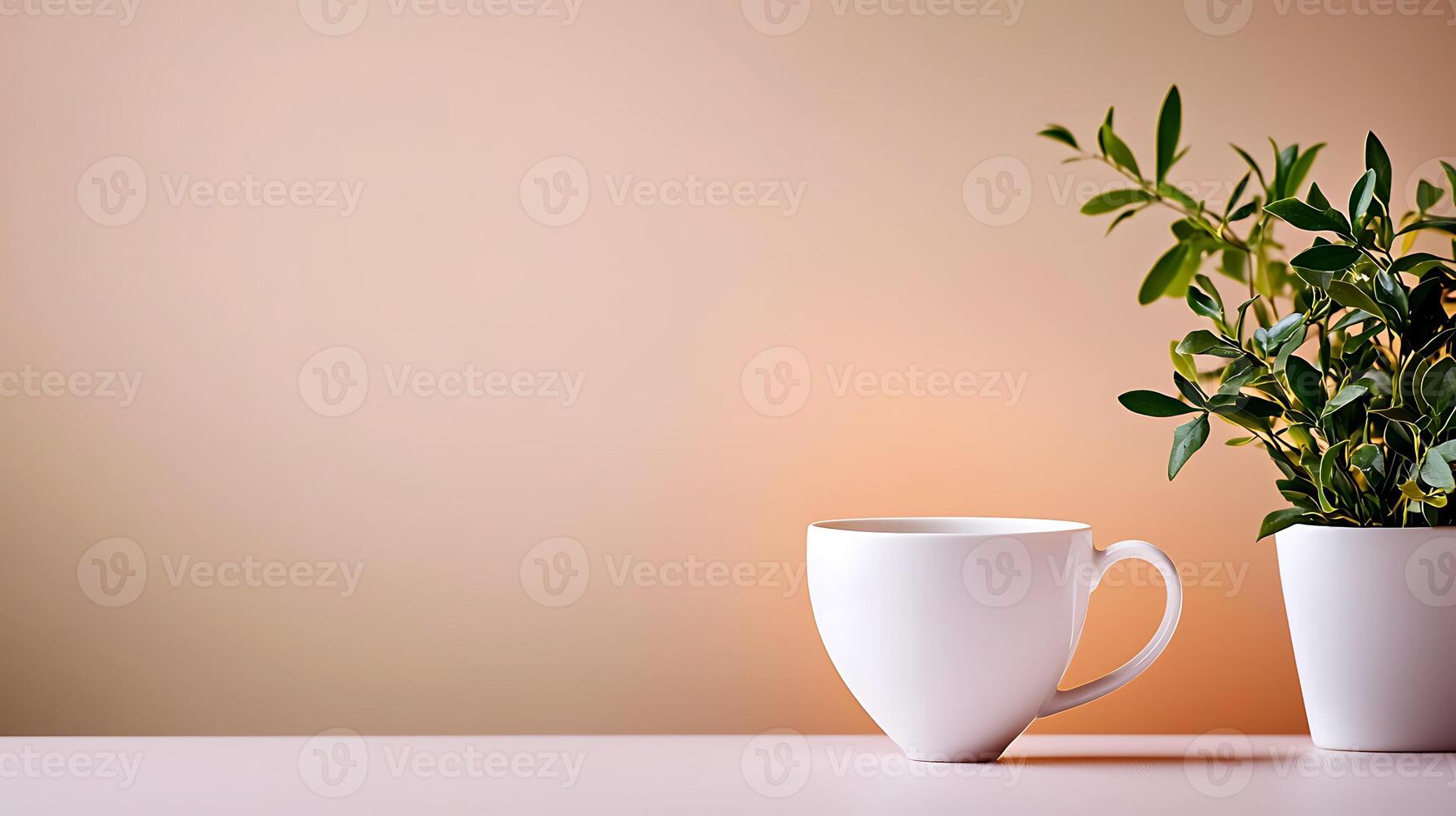 White cup beside a potted plant on a minimalist table against a soft gradient background photo
