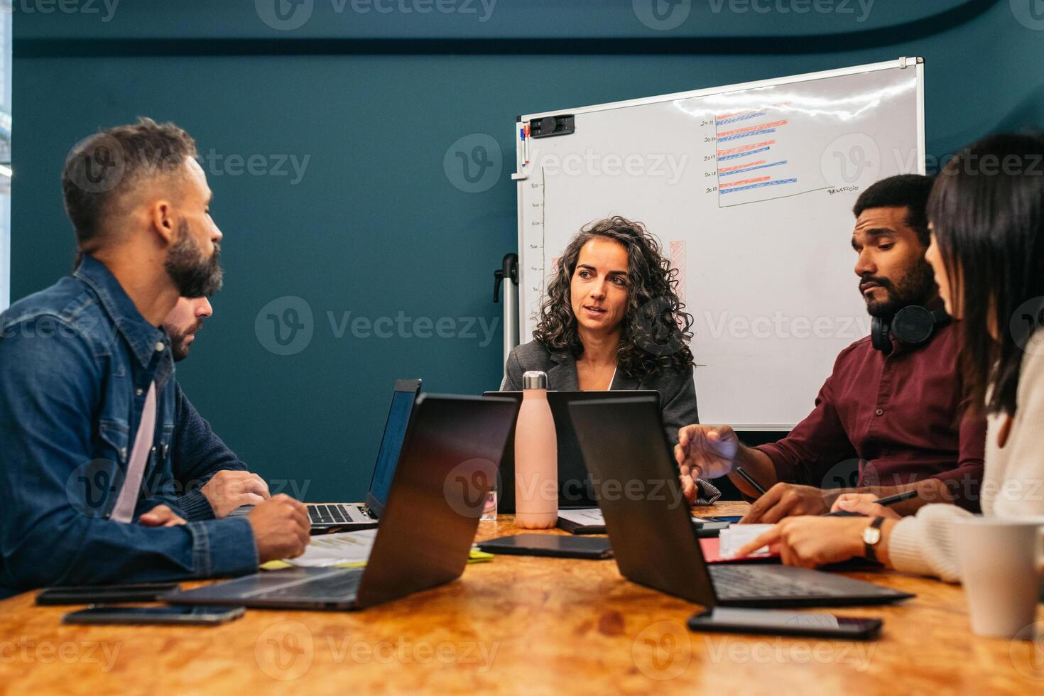 Multiracial colleagues working in a coworking space photo