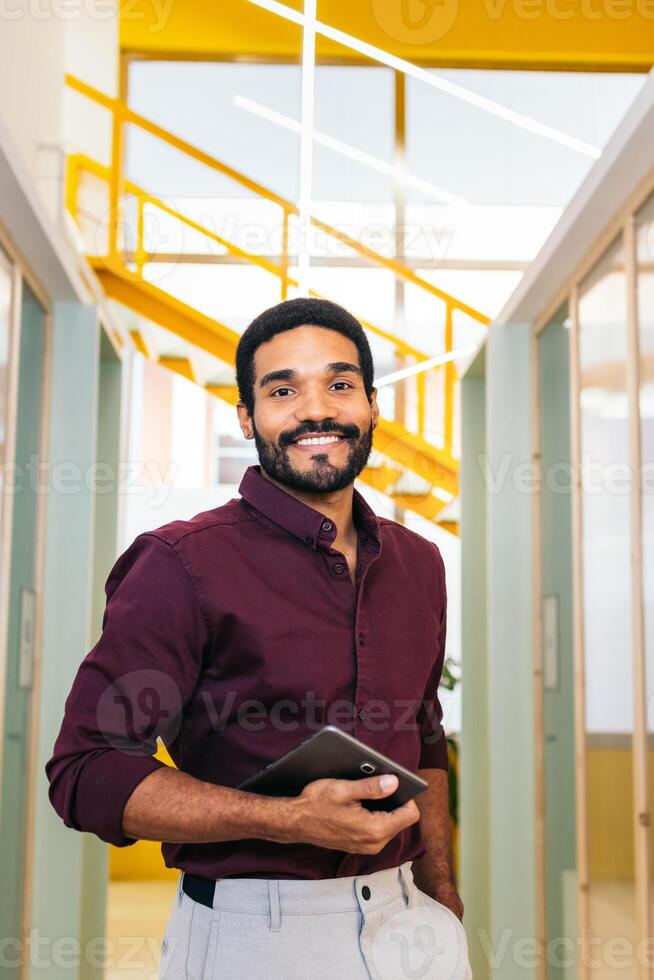 Connecting and Creating A Day in the Collaborative Space. Businessman looking at the camera photo
