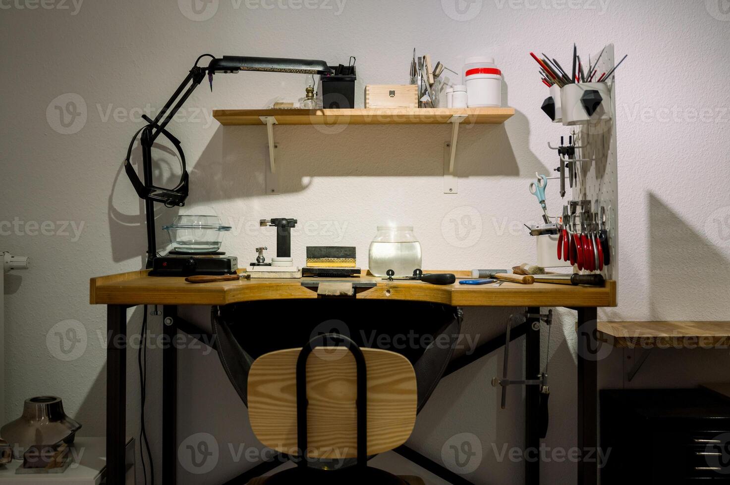 goldsmith workspace in jewelry atelier shop photo