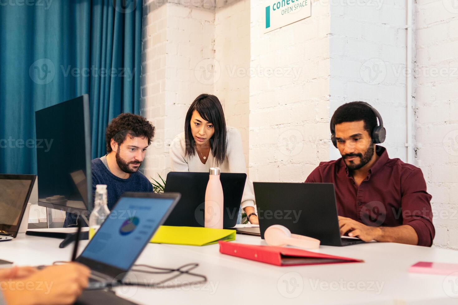 Sharing Success of Coworking in Action. Teamwork photo