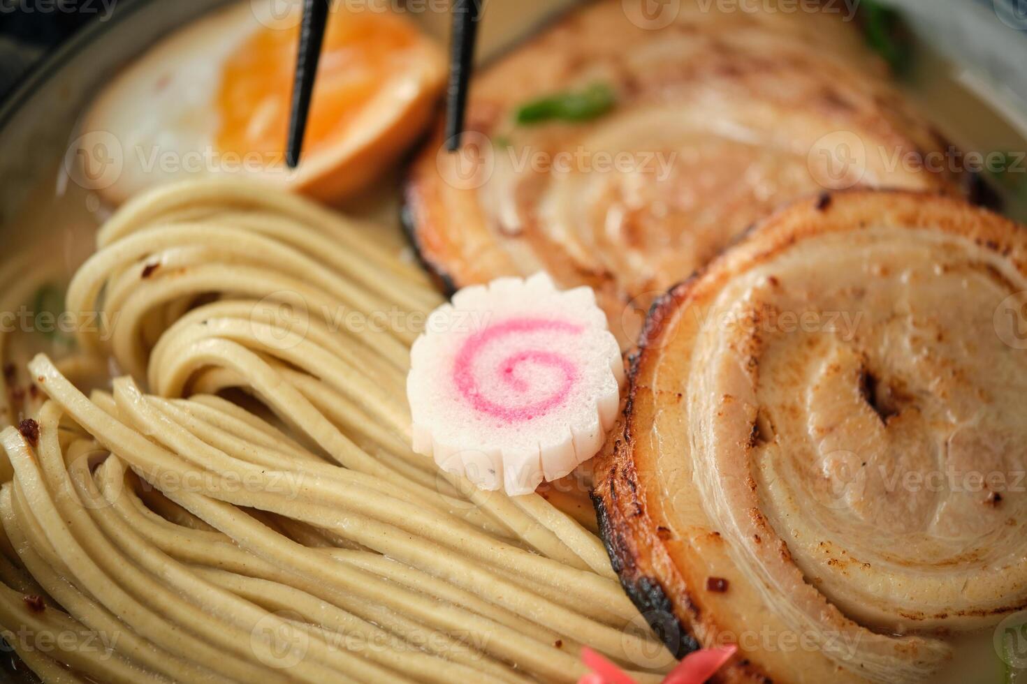 Delicious ramen served with noodles and meat photo