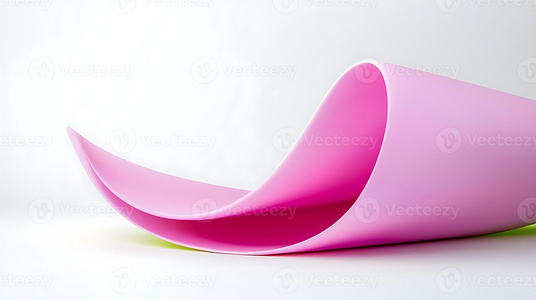 Abstract composition of a pink wave-shaped object on a white background, showcasing smooth curves photo