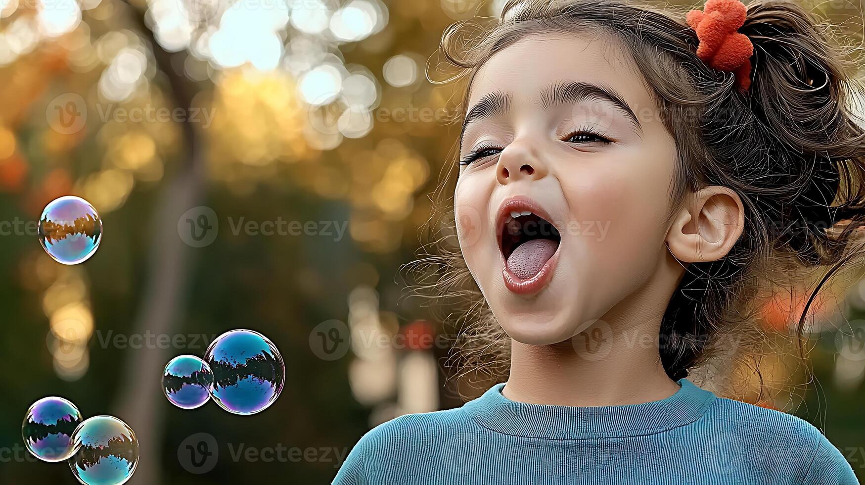 Young girl joyfully playing with bubbles in a vibrant outdoor setting, surrounded by autumn foliage photo