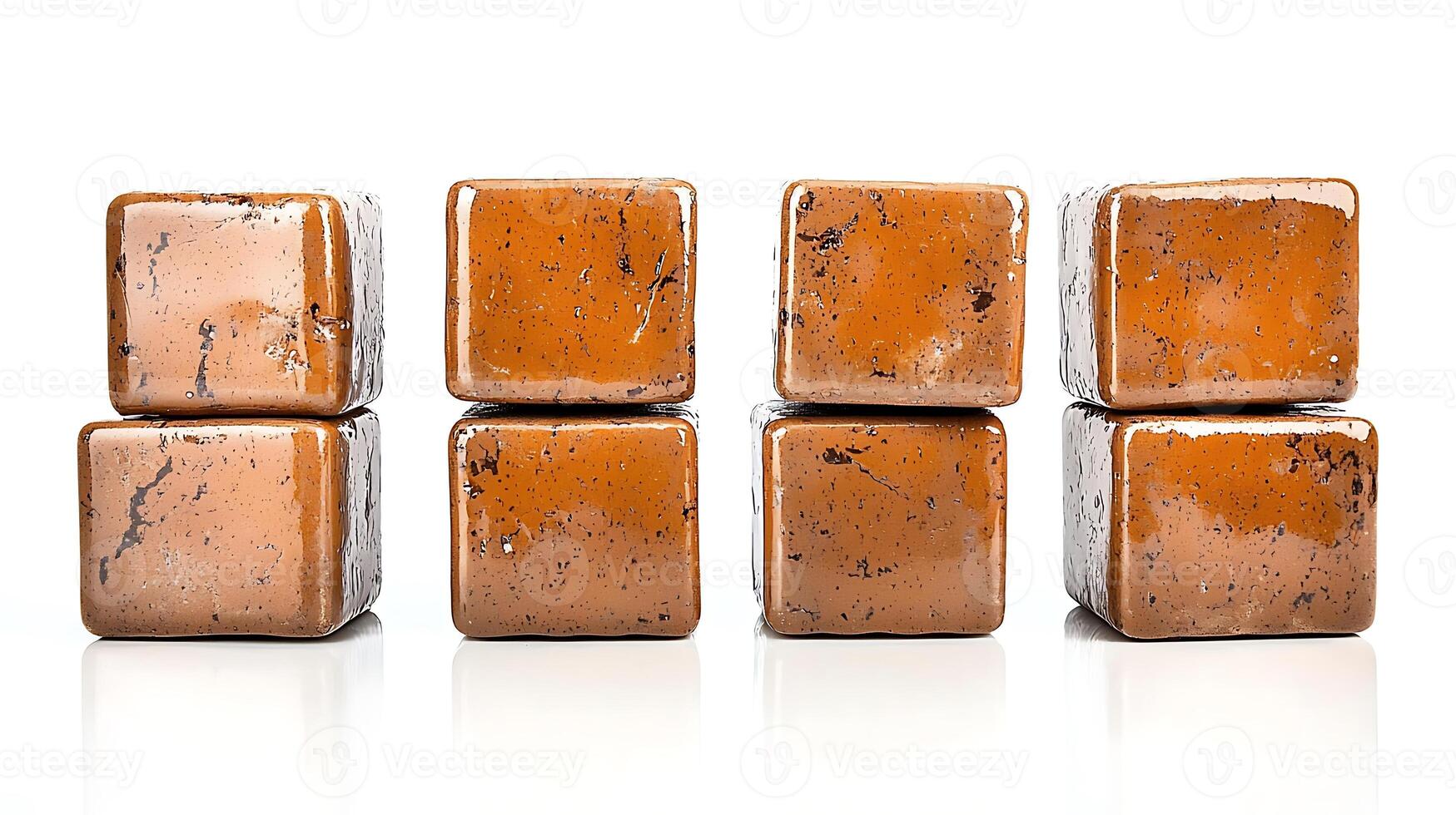 Set of six glossy brown decorative cubes arranged symmetrically on a reflective surface photo