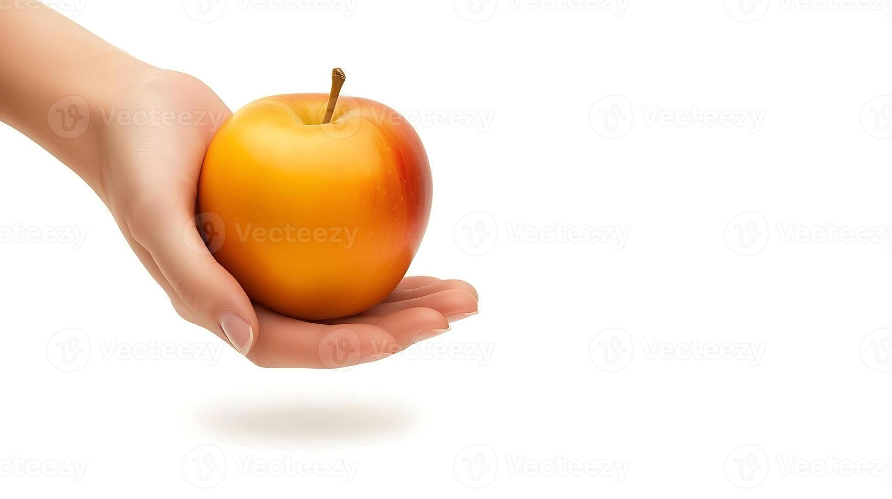 A hand gently holding a vibrant yellow-red apple against a clean white background photo