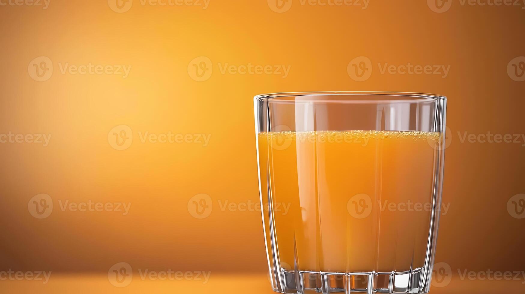 A refreshing glass of orange juice sits on a vibrant orange background, perfect for summer vibes photo