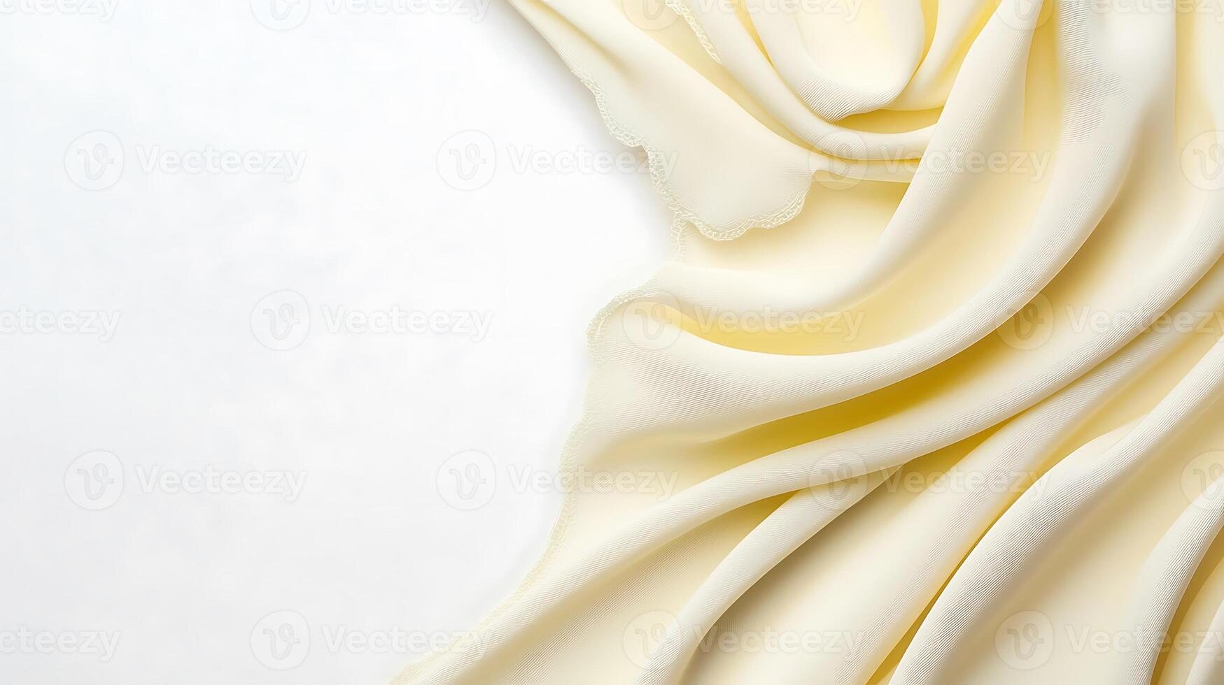Smooth, creamy fabric draped elegantly on a light background, creating a soft and inviting atmosphere photo