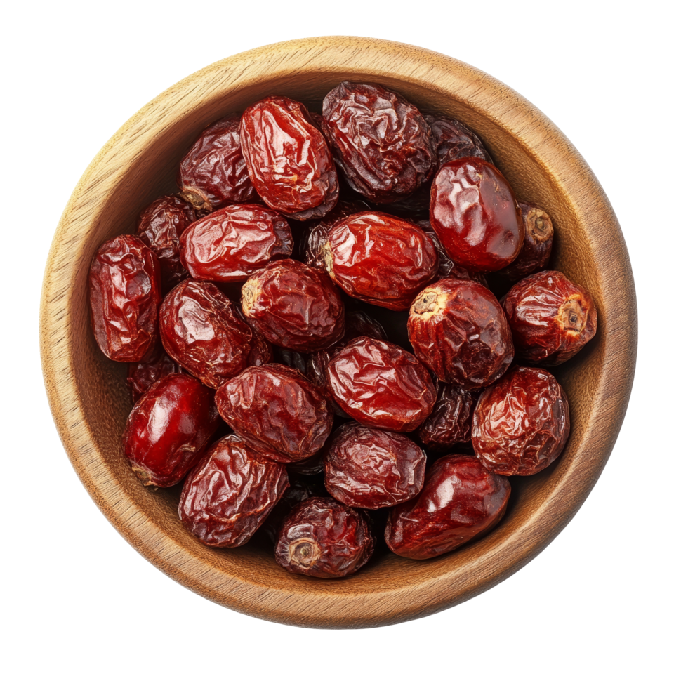 Delicious dried Chinese jujubes in a wooden bowl on a clean transparent background showcasing natural textures and colors, Chinese Jujube dried in wood bowl on transparent background png