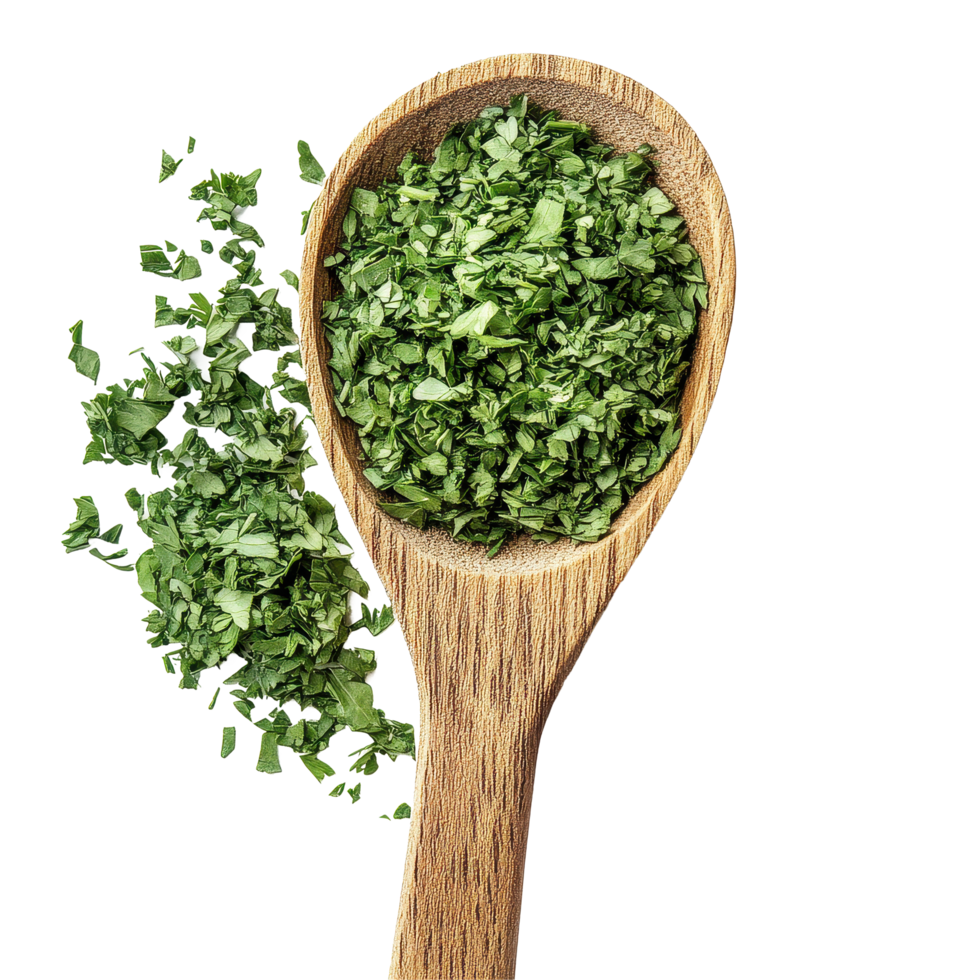 Dry parsley leaves piled in a wooden spoon with scattered leaves on a clean surface, dry parsley leaves, pile with wooden spoon isolated on Transparent background png