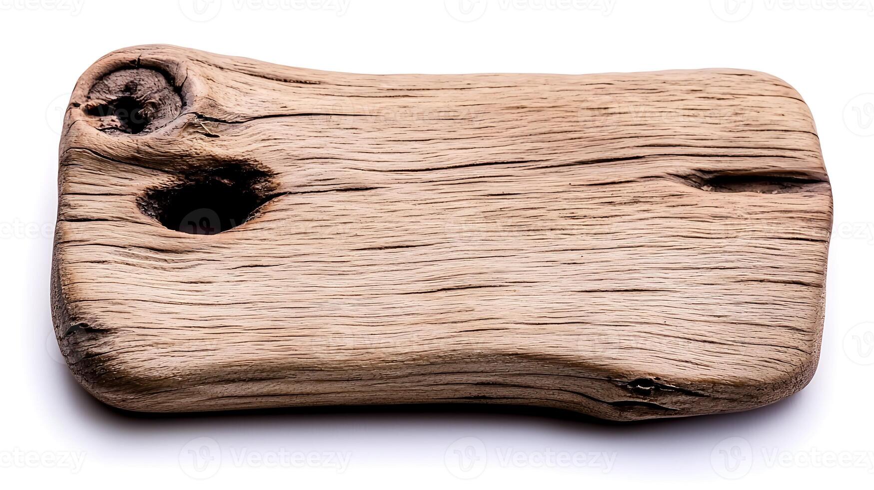 Rustic wooden plank with natural textures and holes, ideal for crafting or decorative use photo