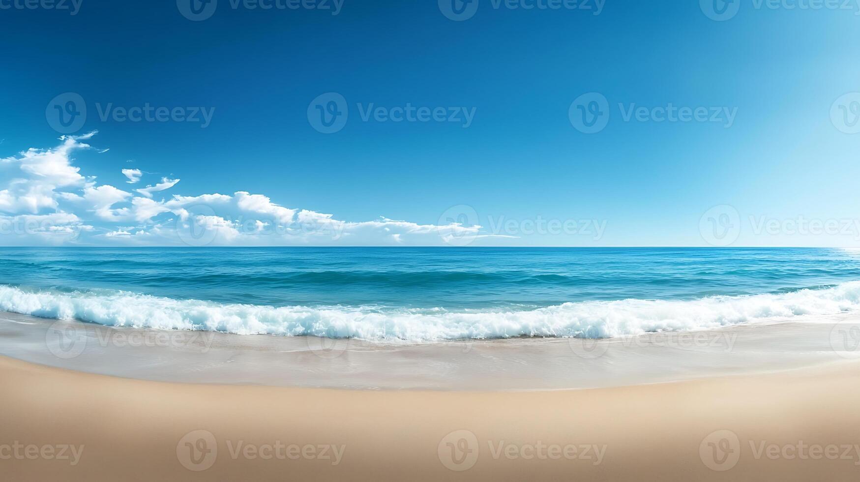 Tranquil beach scene with gentle waves lapping on golden sand under a clear blue sky photo