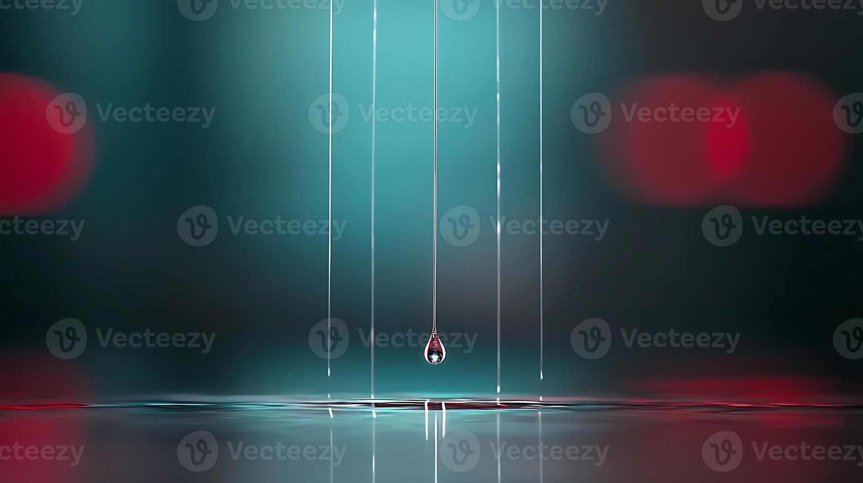 Close-up of water droplets falling into a tranquil pool, with colorful bokeh in the background photo