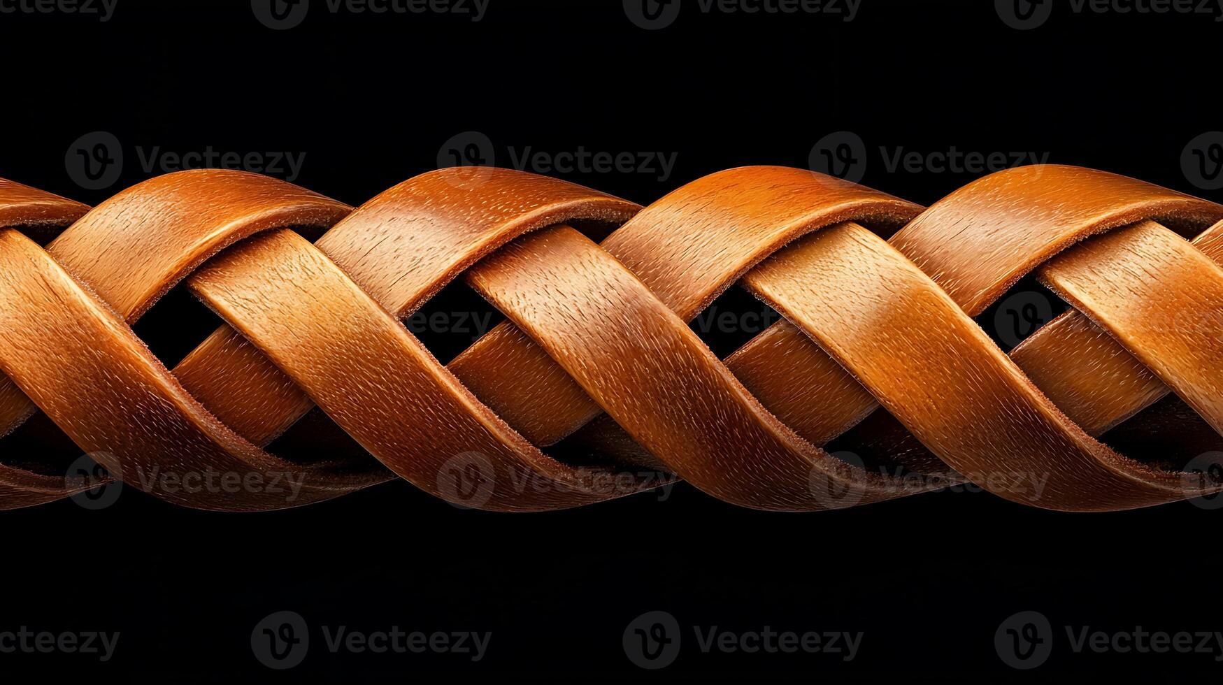 Close-up of intricately woven leather strap showcasing detailed craftsmanship against black background photo