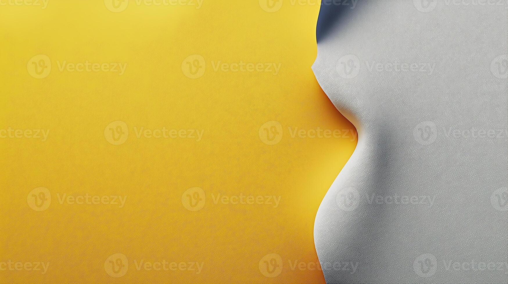 Close-up of a yellow and gray paper surface with a smooth curve, creating a minimalist design photo