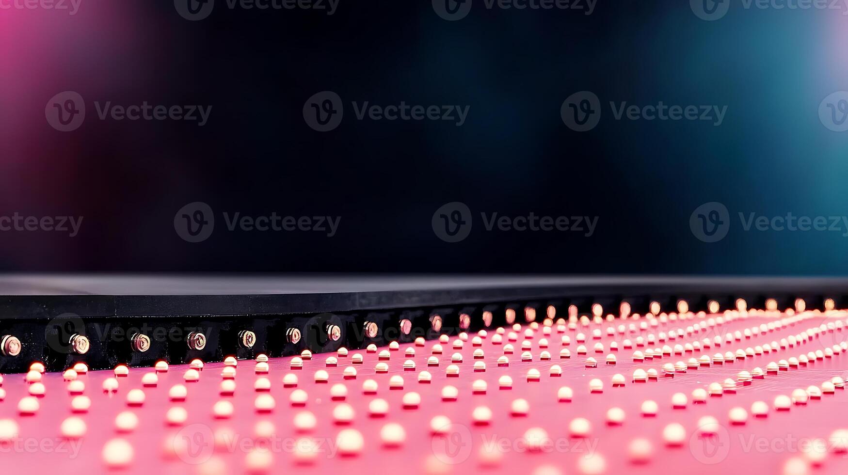Close-up of a vibrant LED display with colorful lights illuminating a dark background photo