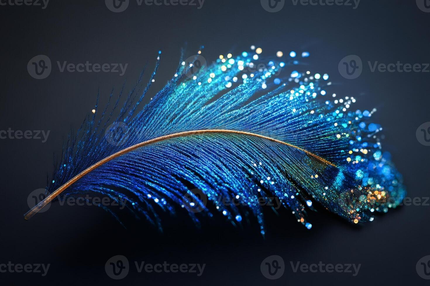 Glittering blue feather creating a trail of sparkling light on dark background photo