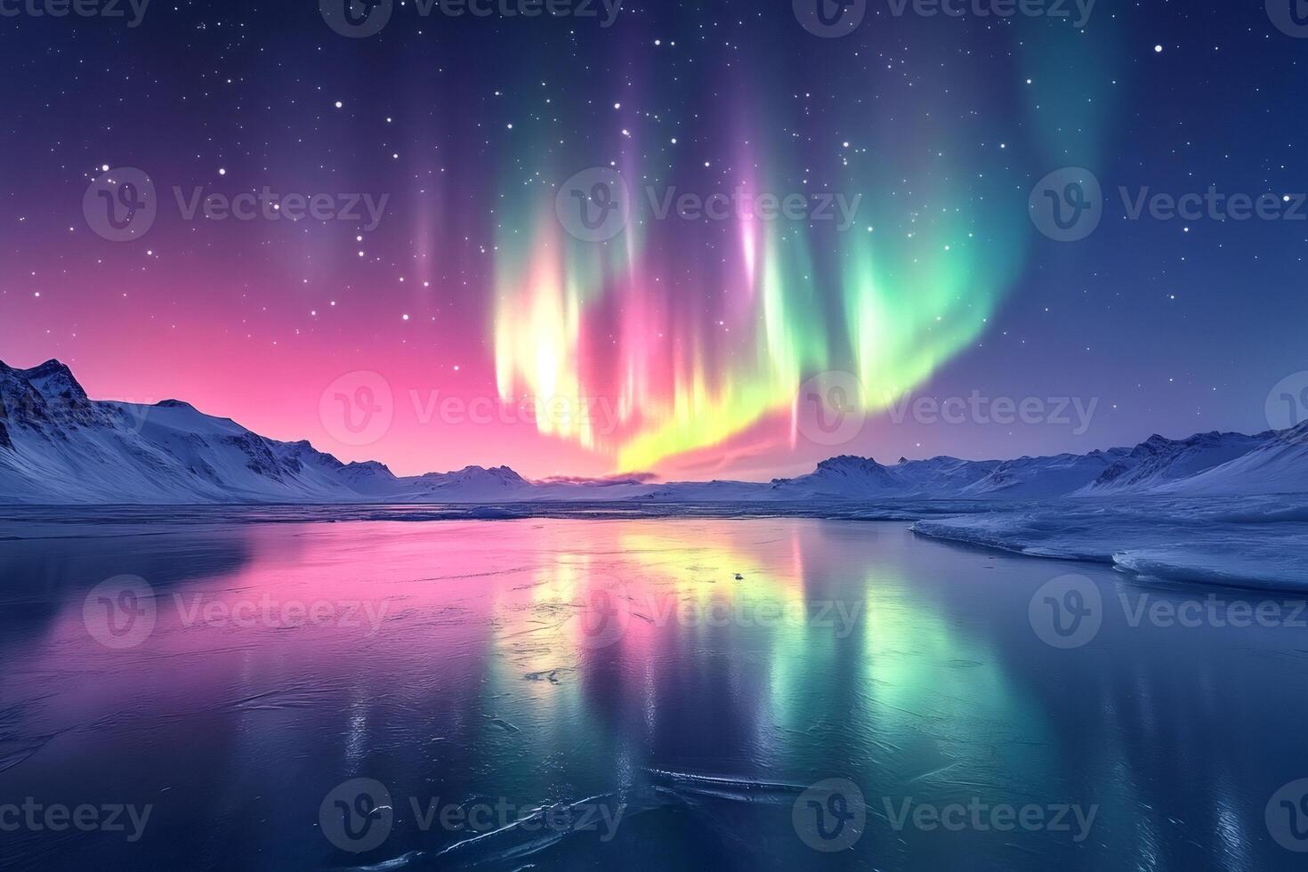 Northern lights reflecting on frozen lake with snowy mountains and starry sky photo