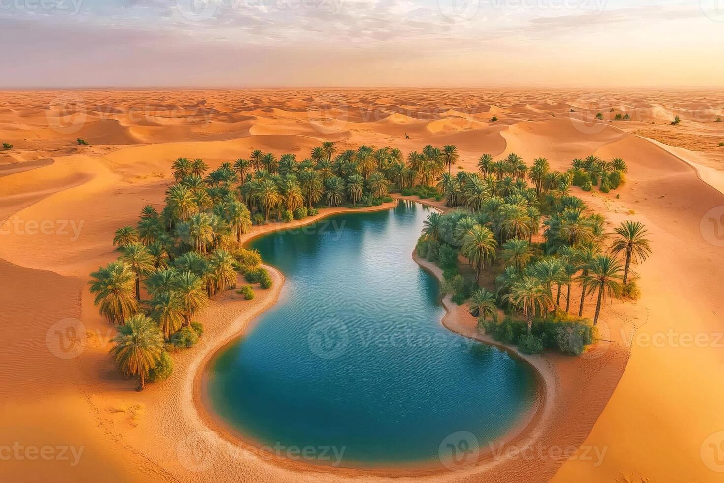 Stunning oasis mirroring the sunrise in the vast desert landscape photo