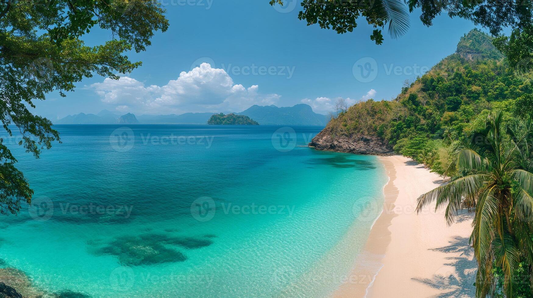 Tropical white sand beach and turquoise water framed by lush vegetation in coron, palawan photo
