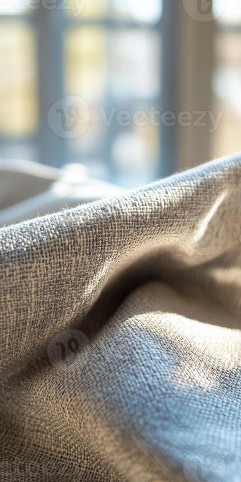 Soft texture of natural linen fabric illuminated by sunlight photo