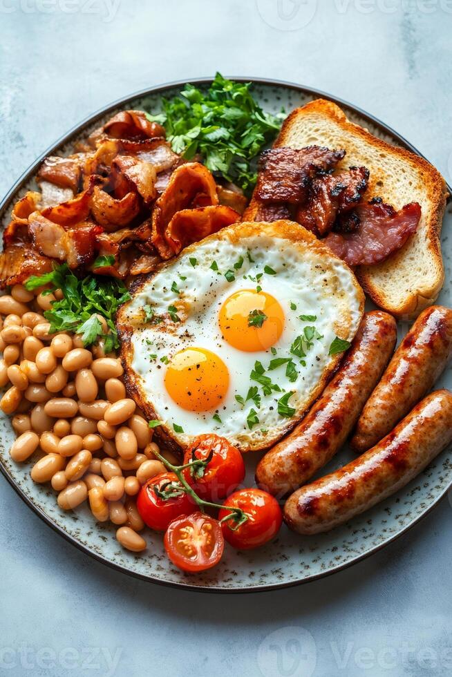 Full english breakfast with fried eggs, sausages, bacon, beans, toast, and tomatoes, creating a hearty morning meal photo