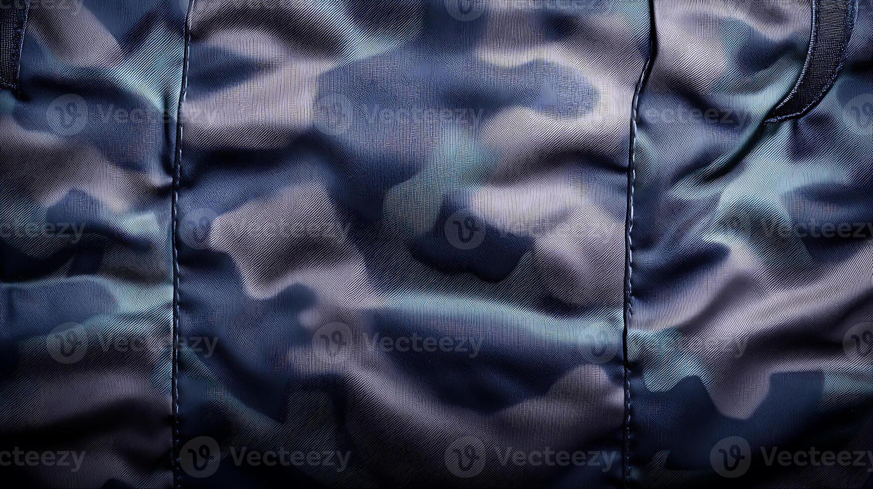 Close-up view of textured camouflage fabric showcasing intricate patterns and hues photo