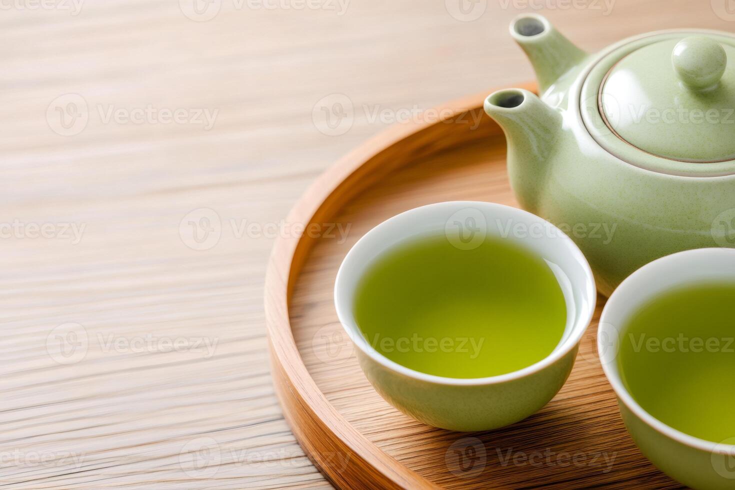 Green tea ceremony set on wooden tray, enjoying traditional asian beverage photo