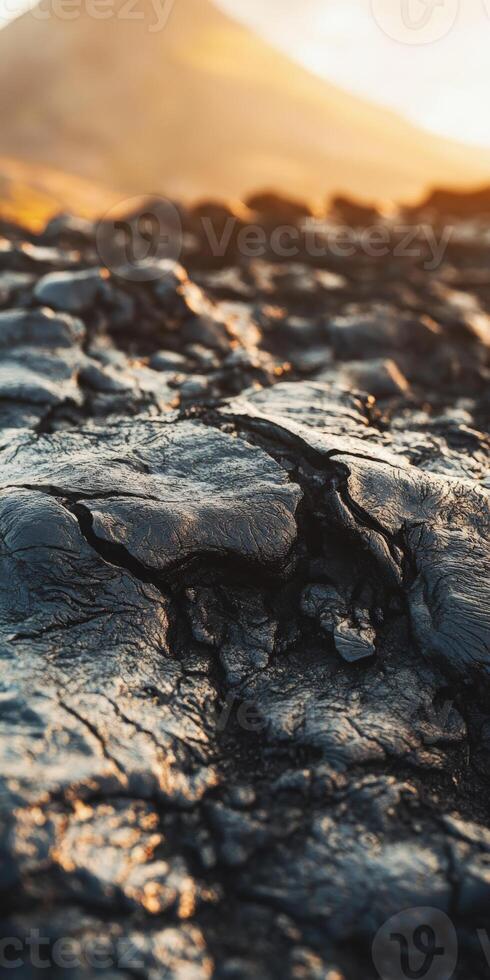 Volcanic lava rock formation during sunset near an active volcano photo