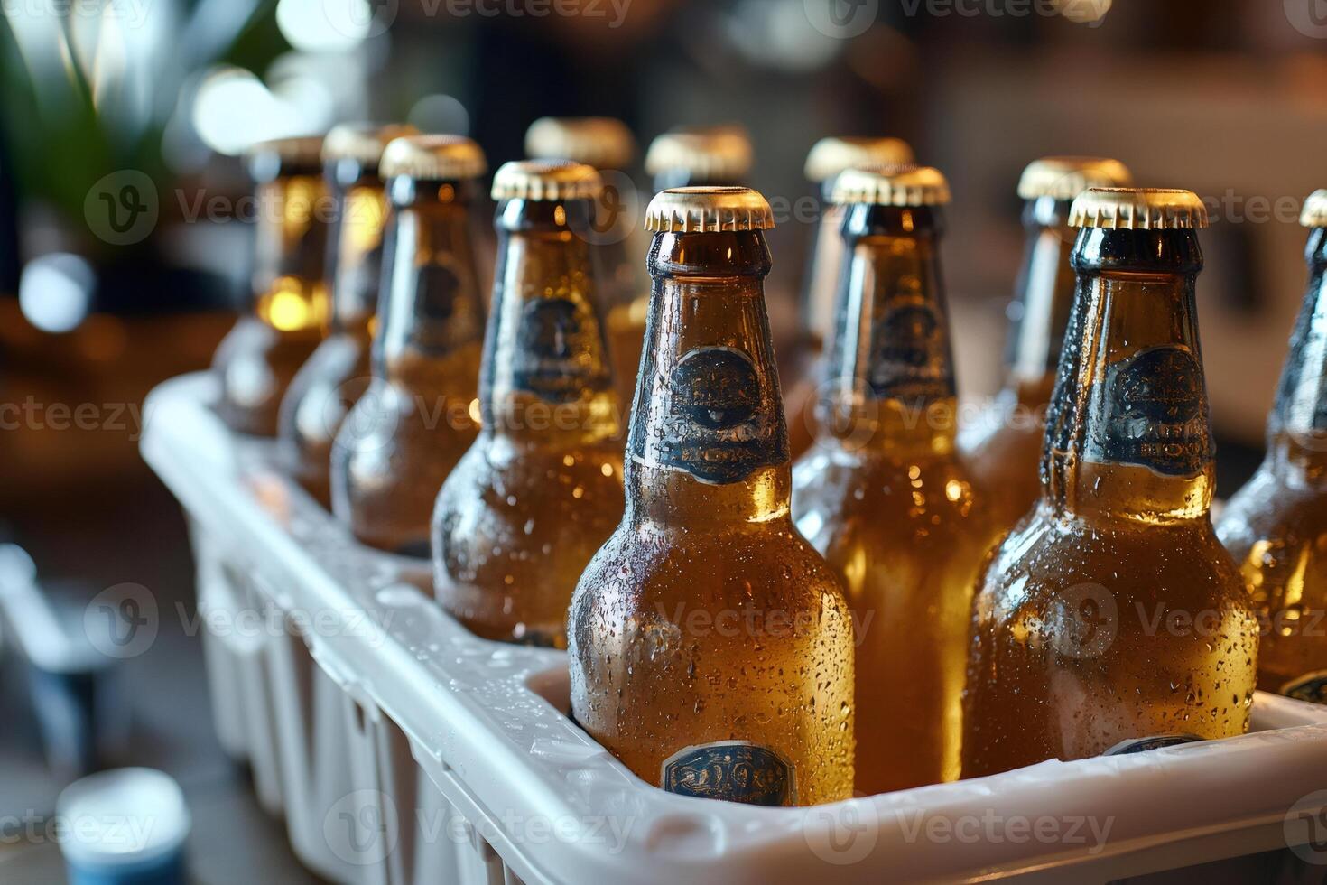 Cooling beer bottles resting in white crate photo