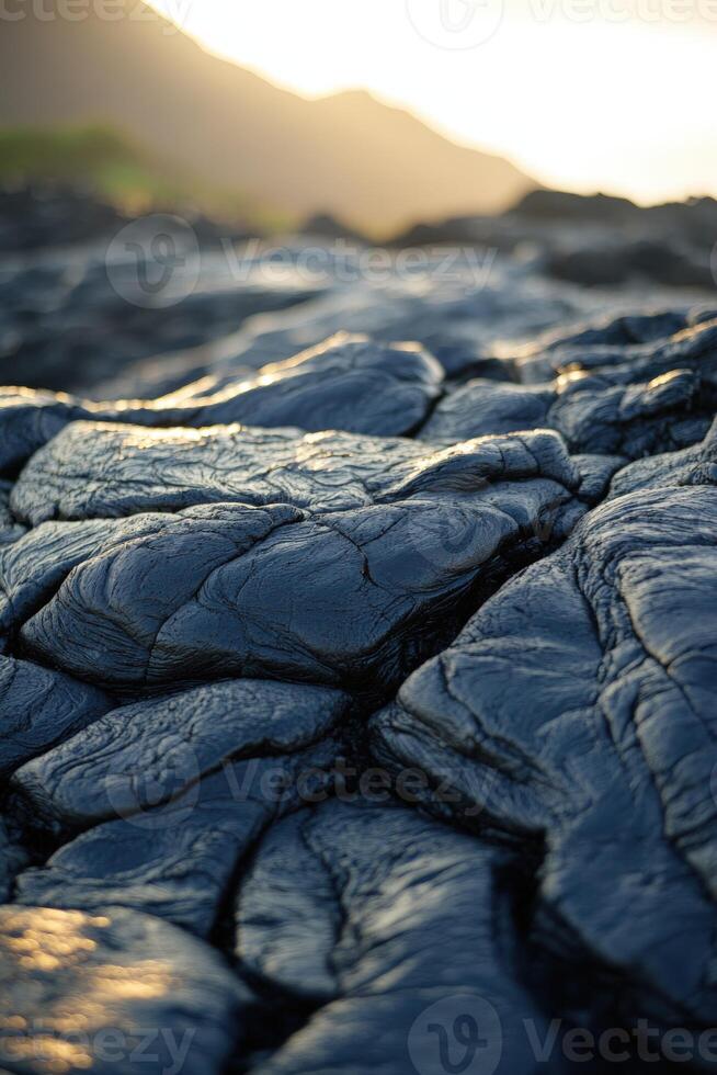 Unique textures of hardened lava flow under the evening light photo