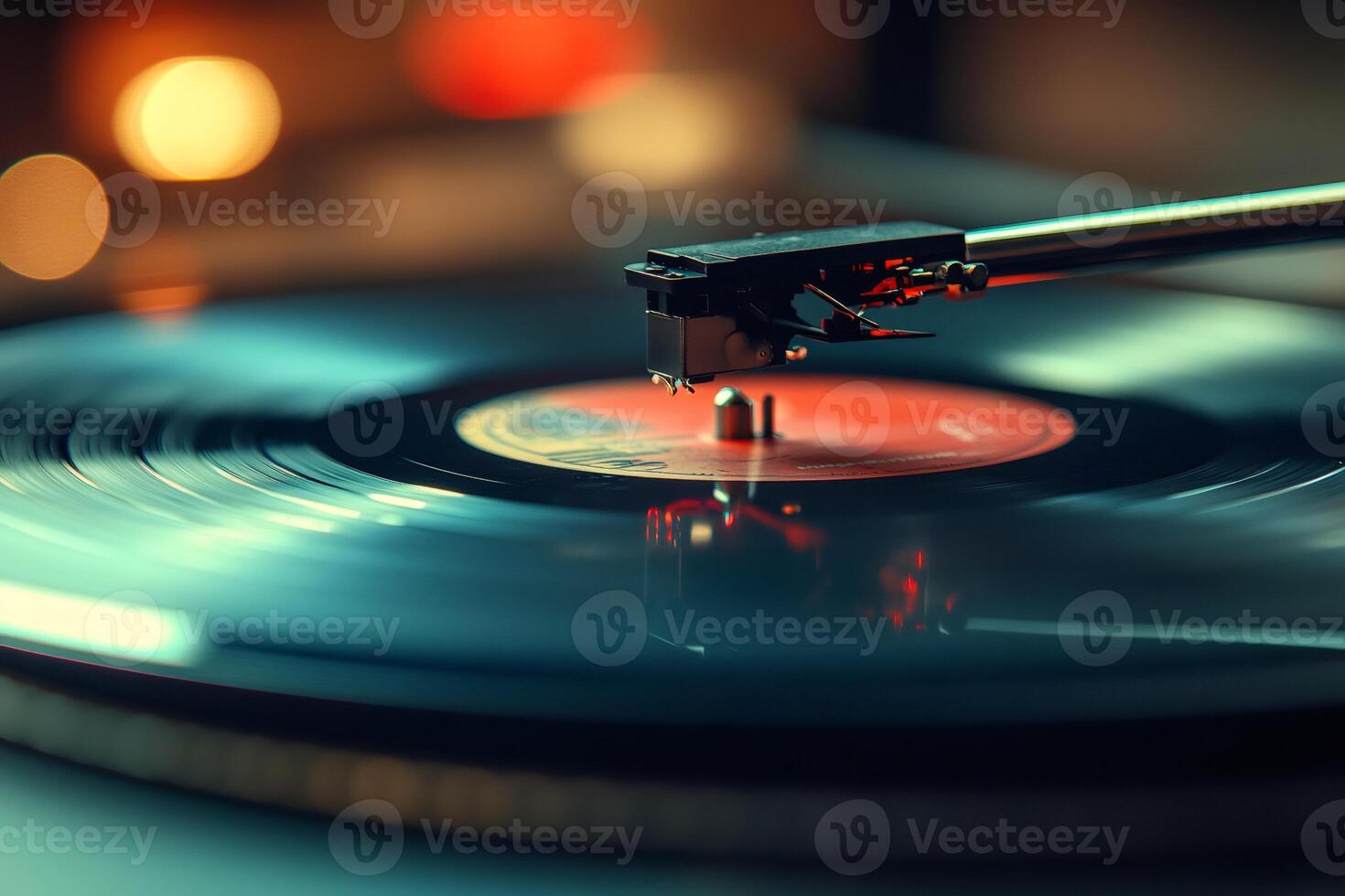 Vinyl record player playing music with blurred background lights photo