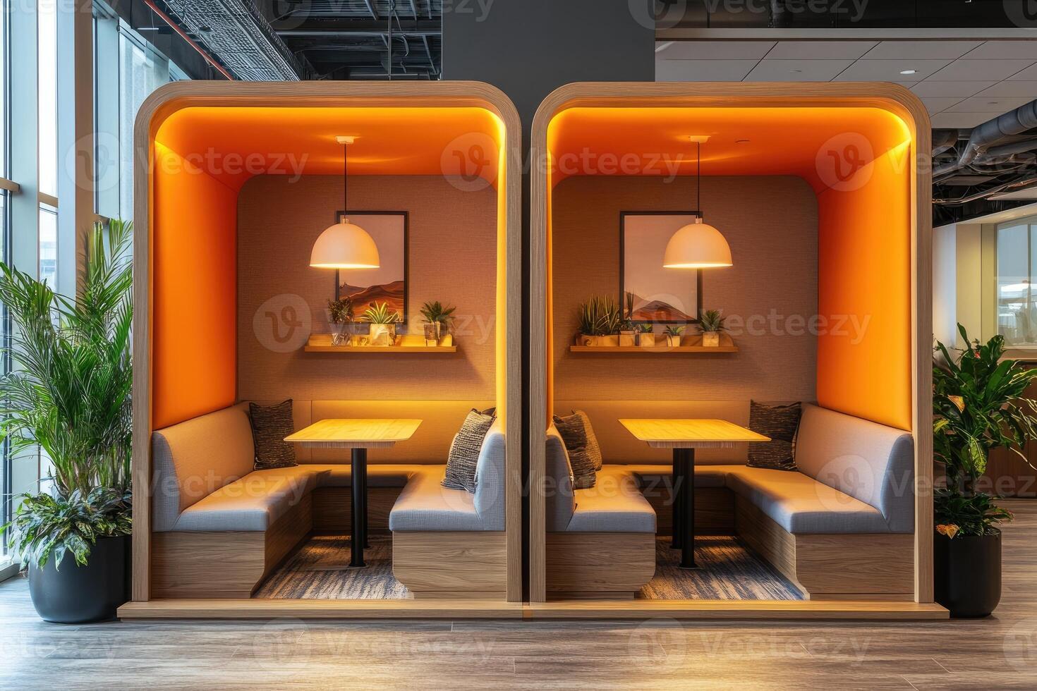 Modern office space offering comfortable seating booths for informal meetings and collaborative work photo