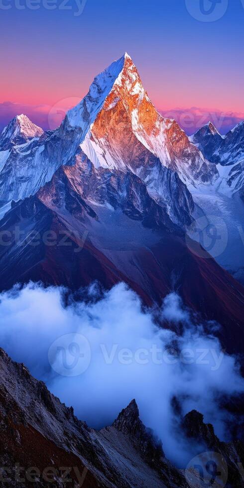 Majestic sunrise over snow-capped mountains photo