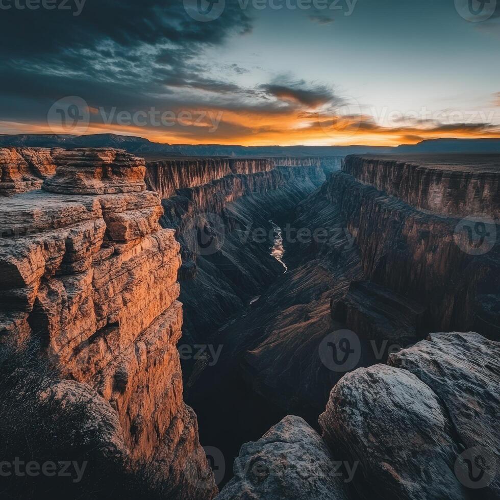The sun sets over the grand canyon at sunset photo