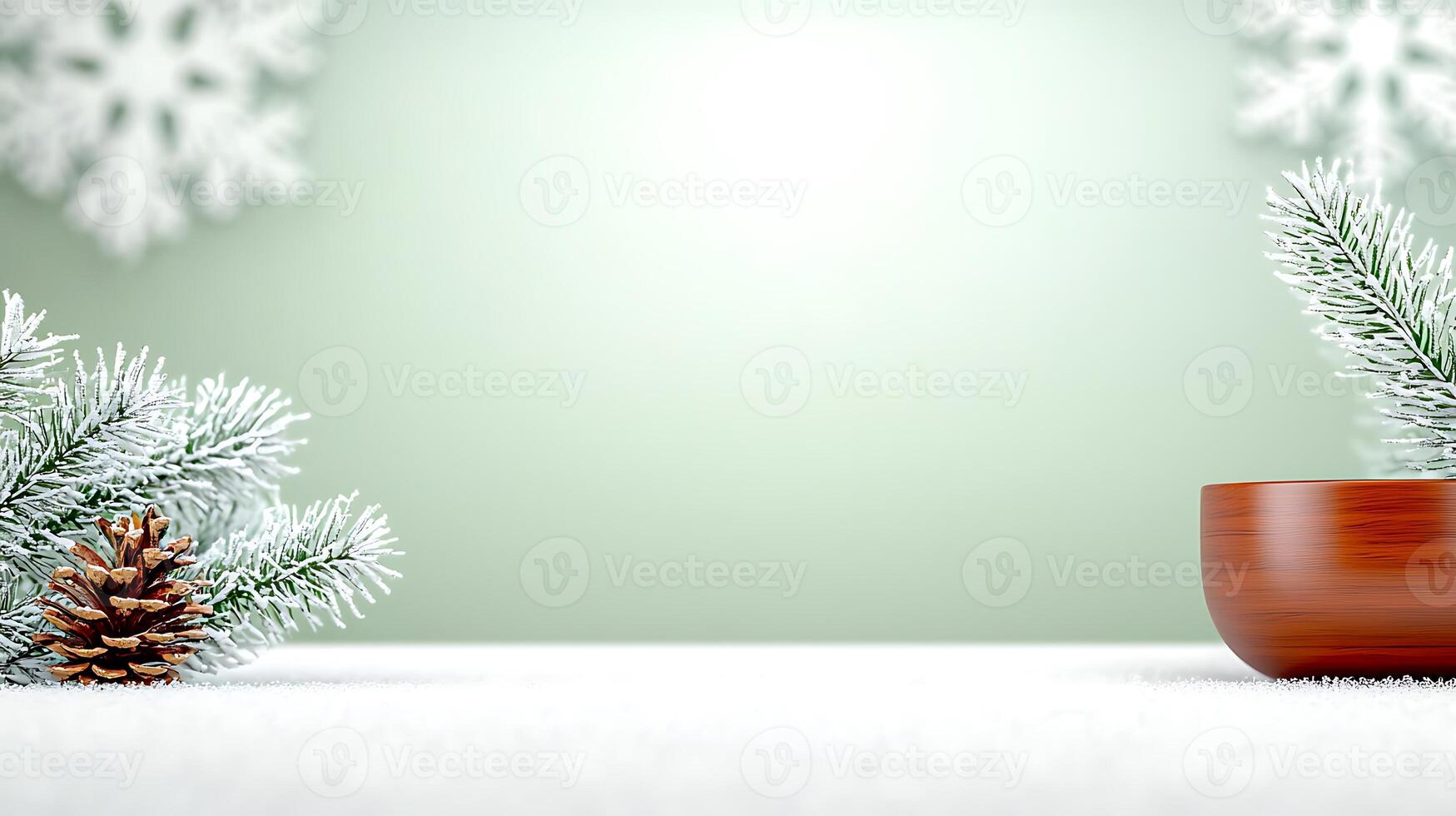 A serene winter scene featuring a wooden bowl, pinecones, and frosted greenery on a snowy surface photo