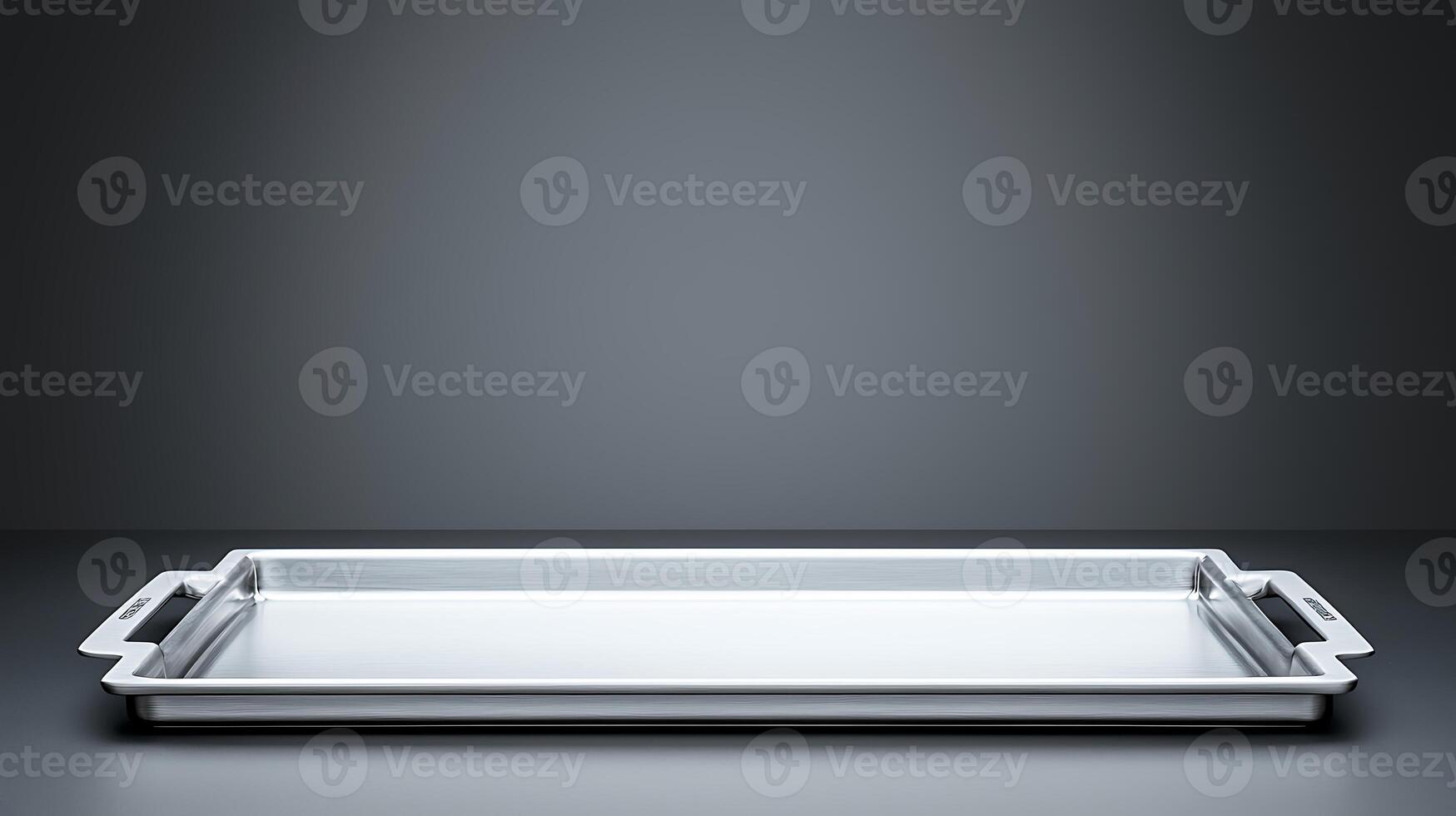 Sleek stainless steel tray on a minimalist gray background, ideal for culinary presentations photo